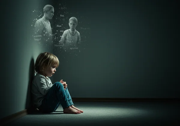 Child looking sad from criticism, negative childhood experiences